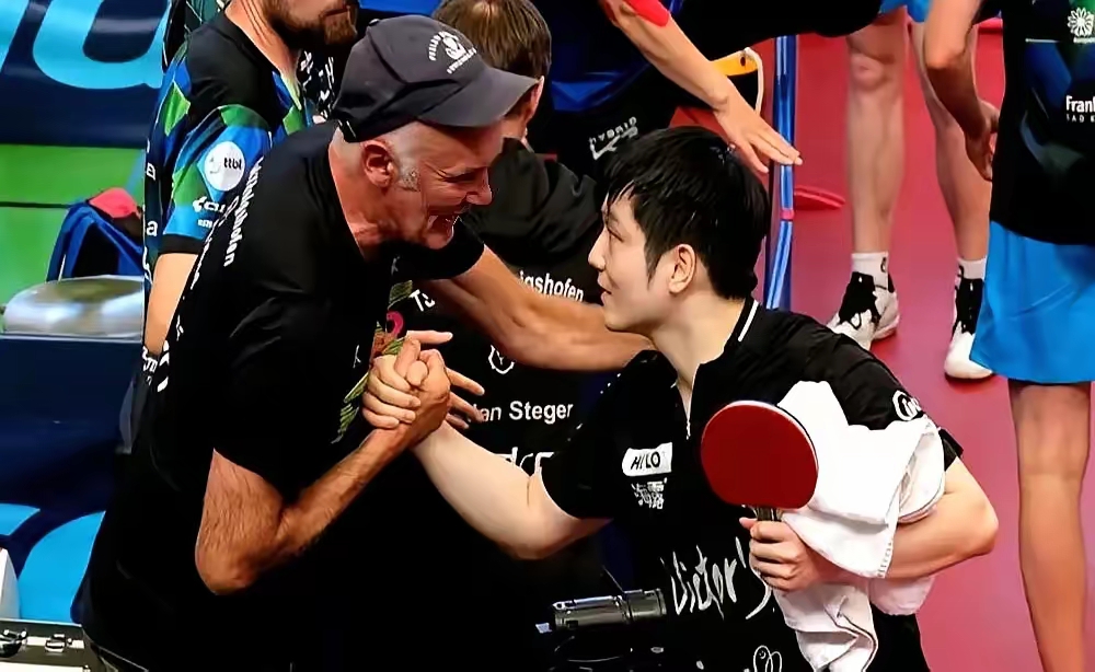 包含英国乒乓球队力克德国乒乓球队，樊振东关键制胜的词条